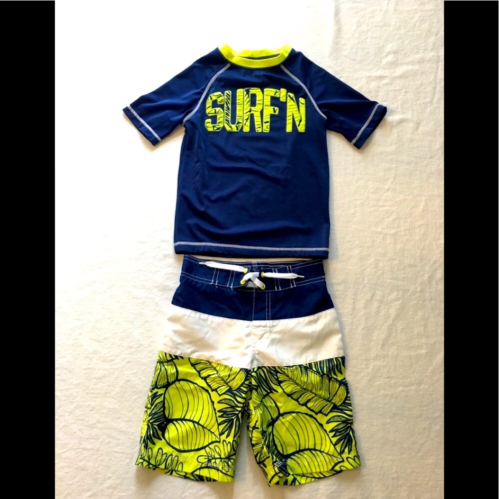 Swim trunks and short sleeve rashguard 🌊
